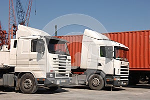 Trucks and containers in port