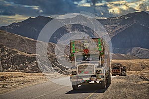 Trucks on the high altitude Manali-Leh road in Lahaul valley, state of Himachal Pradesh