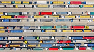 Trucks in line at the loading terminal. Transportation of goods by cars