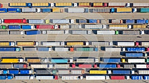 Trucks in line at the loading terminal. Transportation of goods by cars