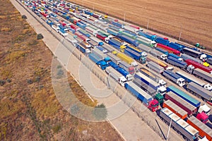 Trucks in line at the loading terminal. Transportation of goods by cars