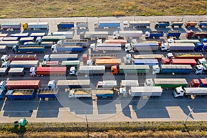 Trucks in line at the loading terminal. Transportation of goods by cars