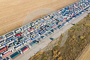 Trucks in line at the loading terminal. Transportation of goods by cars