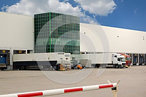 Trucks loading at a warehouse