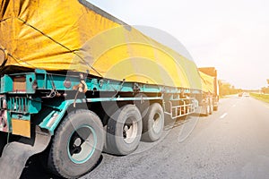 Trucks Logistic by Cargo truck Import Export business and Industrial on the road