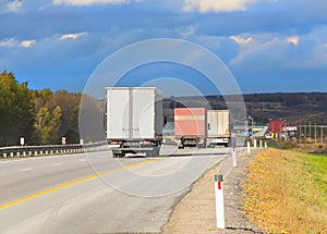 trucks move on mountain road