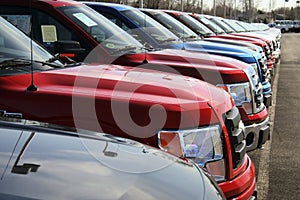 Trucks in new car lot