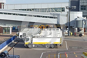 Trucks parked in a row specially equipped for aircraft de-icing before departure