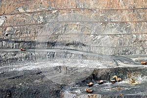 Trucks in Super Pit gold mine Australia