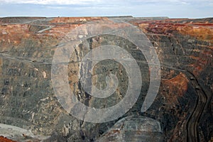 Trucks in Super Pit gold mine Australia