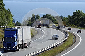 Trucks and trafic on busy freeway