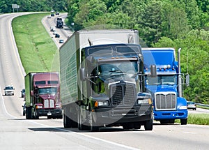 Trucks traveling along the highway