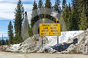 Trucks Use Low Gear Steep Grade Road Sign in the Mountains