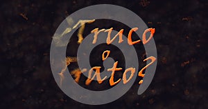 Truco o Trato (Trick or Treat) Spanish text dissolving into dust from left photo
