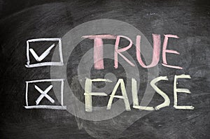 True and false check boxes written on a blackboard