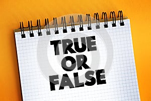 True Or False text on notepad, concept background