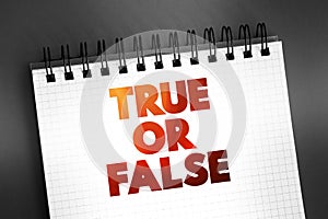 True Or False text on notepad, concept background