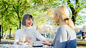 True friendship friendly close relations. Conversation of two women cafe terrace. Friendship meeting. Togetherness