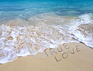 True love sign in beach sand