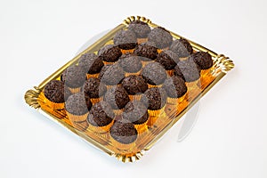 Truffle cupcakes in a tray on white background