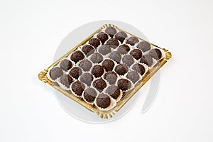 Truffle cupcakes in a tray on white background