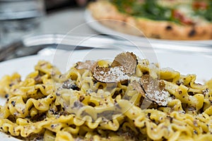 Truffle pasta close up with truffle pieces photo