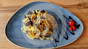 truffle tagliatelle on a nicely decorated plate