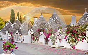 Trulli houses in Alberobello city at sunset, Apulia, Italy.