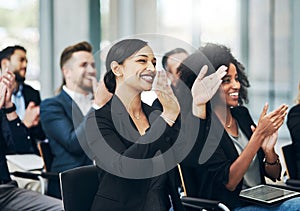 Truly marvelous. a group of businesspeople applauding during a seminar in the conference room.