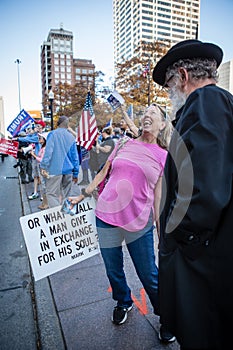 Trump Supporters Wave Signs at Passing Traffic at the Ohio Statehouse