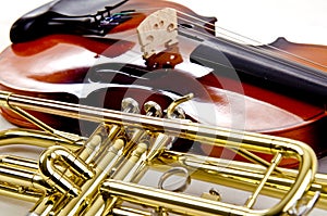 Trumpet and shiny violin close up