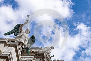 Trumpeting angel on the facade of the church of St. Mary of the Lily Chiesa di Santa Maria del Giglio, Campo Santa Maria Zobenig