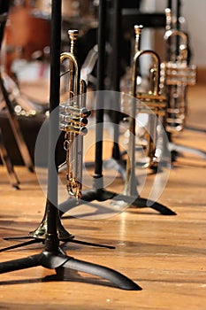 Trumpets on stands on stage