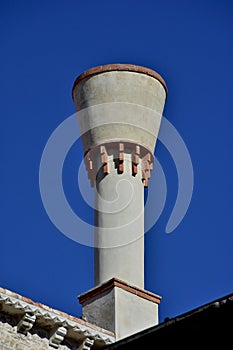 Truncated cone chimney in Venice photo