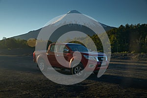 Trunk 4x4 vehicle pack shot at Petrohue fall and Osorno Volcano. Puerto Varas, Chile, South America.