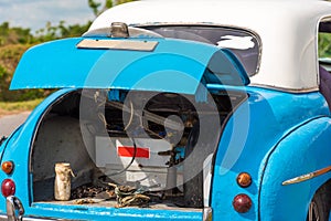 Trunk of the retro car, Vinales, Pinar del Rio, Cuba. Car repairs. Close-up.