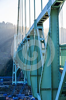 Truss of St Johns Bridge over Willamette River in the sunlight