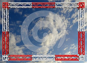 Trusses construction red and white decorative border against the sky.