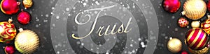 Trust and Christmas,fancy black background card with Christmas ornament balls, snow and an elegant word Trust, 3d illustration