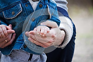 Trust family hands of child son and father