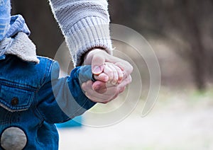 Trust family hands of child son and father