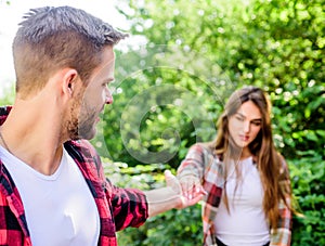 Trust me. man in selective focus with girl in park. couple in love. family weekend. romantic date. happy valentines day