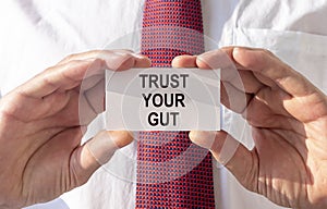 Trust your gut inscription. Follow instincts concept photo