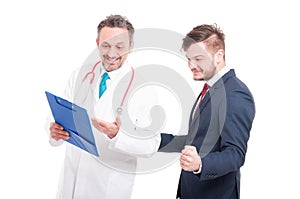 Trustworthy doctor and businessman patient