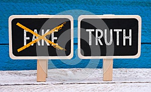 The truth - no fake - two little chalkboards with text