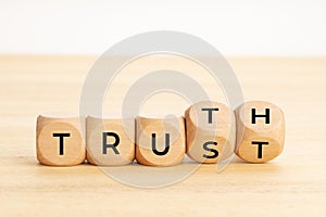 Truth or trust concept. Text on wooden blocks