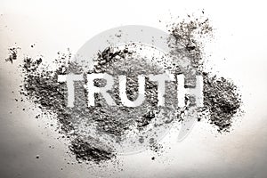 Truth word written in ash, dust, dirt or filth as a cynical concept of lie or post truth in society, politics