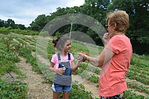 `Try one strawberry, grandma!`