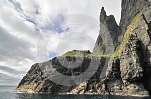 Trøllkonufingur - imposing rock pillar of Sandavágur.