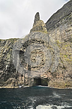 Trøllkonufingur - imposing rock pillar of Sandavágur.